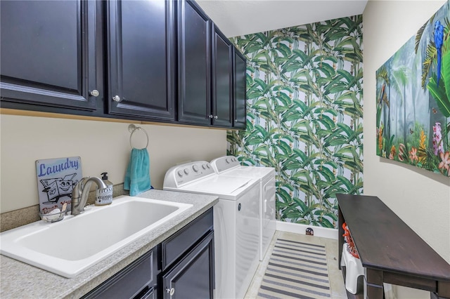 10446 Highland Park Pl, Palmetto, FL 34221 - clothes washing area featuring wallpapered walls, washer and dryer, an accent wall, cabinet space, and baseboards