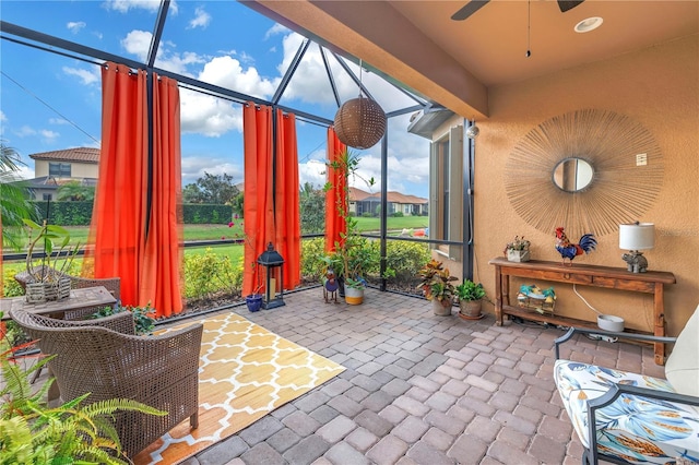 10446 Highland Park Pl, Palmetto, FL 34221 - sunroom / solarium featuring a ceiling fan
