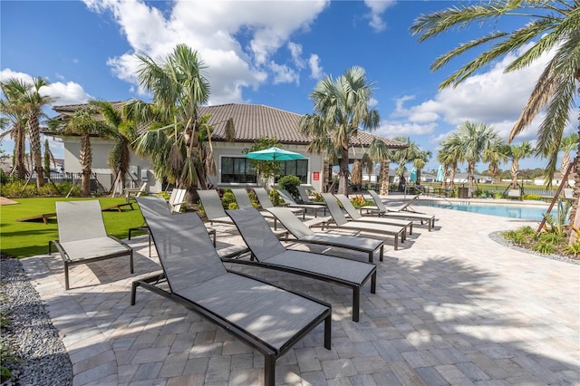 10446 Highland Park Pl, Palmetto, FL 34221 - view of patio / terrace featuring a community pool