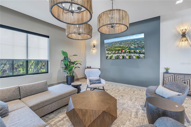 10446 Highland Park Pl, Palmetto, FL 34221 - living room with a chandelier and baseboards