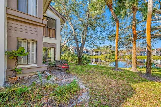 view of yard featuring a water view