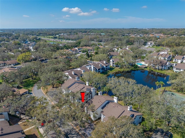 bird's eye view with a water view and a residential view