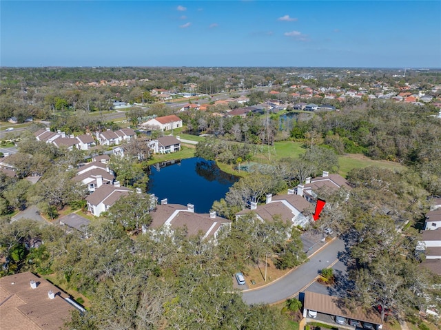 aerial view with a residential view and a water view