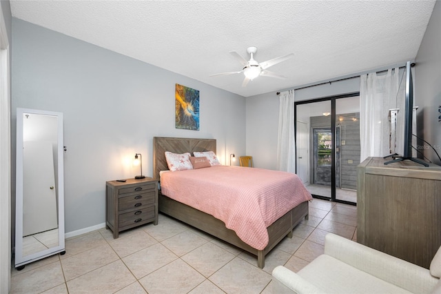 bedroom with light tile patterned floors, baseboards, ceiling fan, access to outside, and a textured ceiling