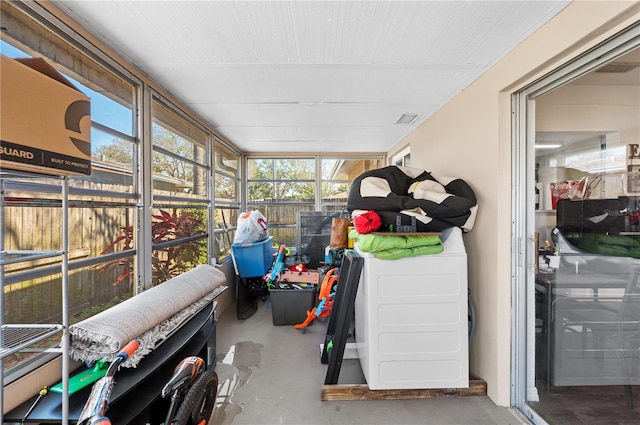 sunroom with plenty of natural light and visible vents