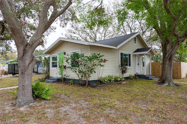 view of front of property with fence