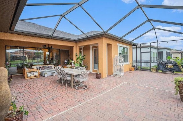 sunroom featuring vaulted ceiling