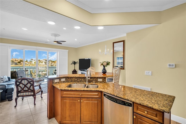 kitchen with crown molding, stone counters, dishwasher, and a sink