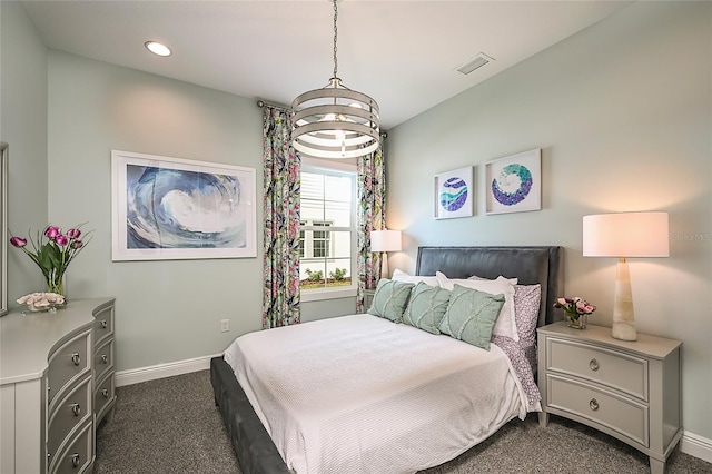 bedroom featuring recessed lighting, dark carpet, visible vents, and baseboards