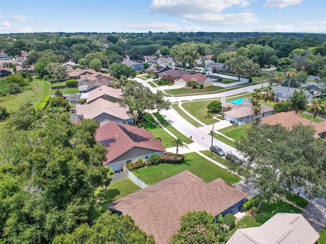 birds eye view of property with a residential view