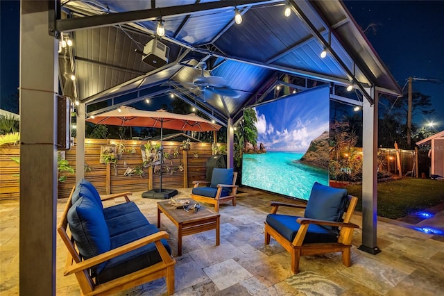 view of patio featuring an outdoor living space and a gazebo