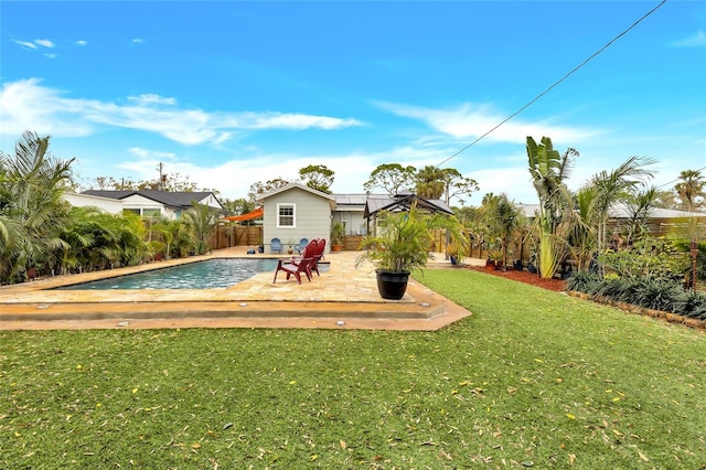 view of yard featuring a patio and fence