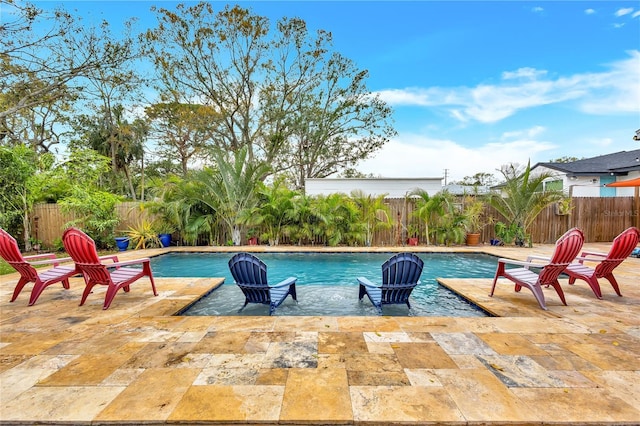 view of swimming pool with a fenced in pool, a patio area, and a fenced backyard