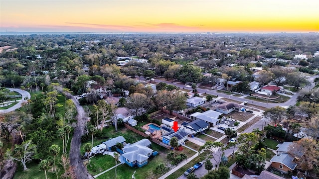 aerial view at dusk with a residential view