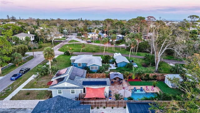 aerial view at dusk with a residential view