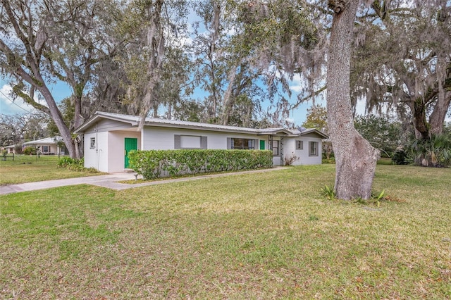 ranch-style house with a front yard