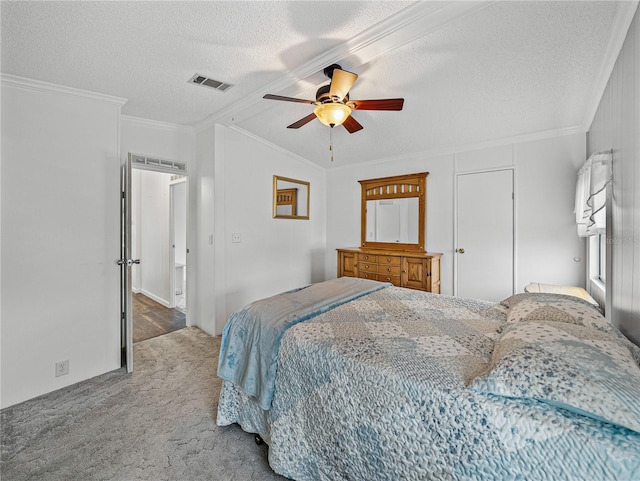 bedroom featuring a textured ceiling, carpet floors, a ceiling fan, visible vents, and crown molding