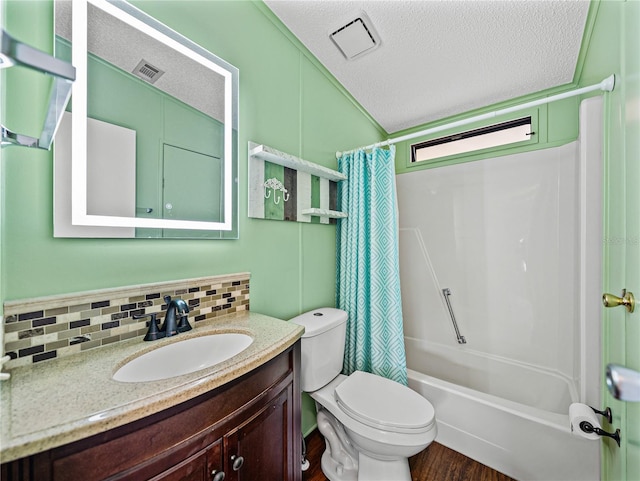 full bathroom with tasteful backsplash, visible vents, toilet, a textured ceiling, and vanity