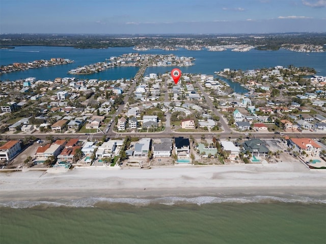 drone / aerial view with a water view and a residential view