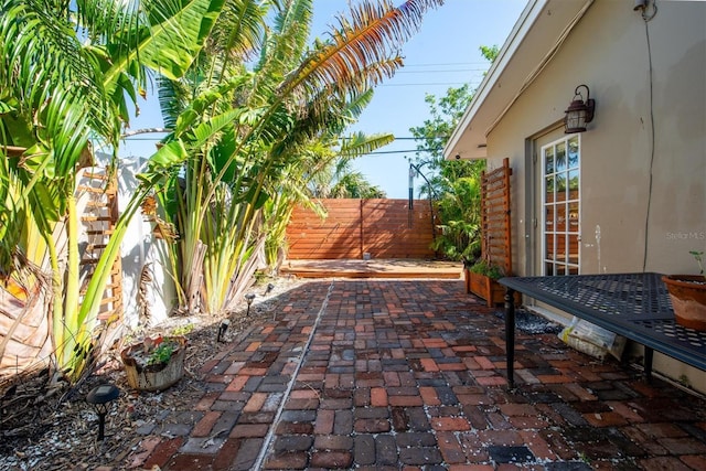 view of patio with fence