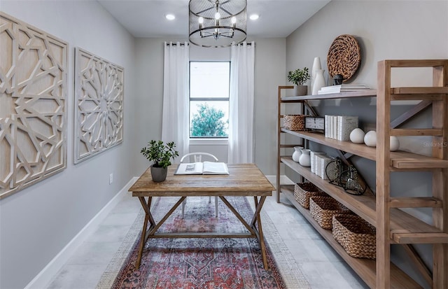 office space with recessed lighting, a notable chandelier, and baseboards