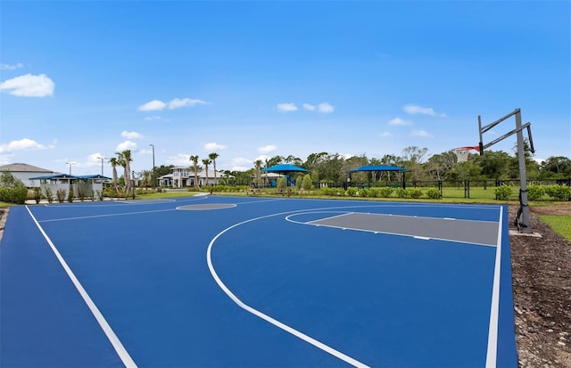 view of sport court featuring community basketball court and fence