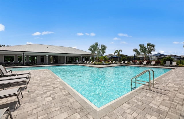 community pool featuring a patio