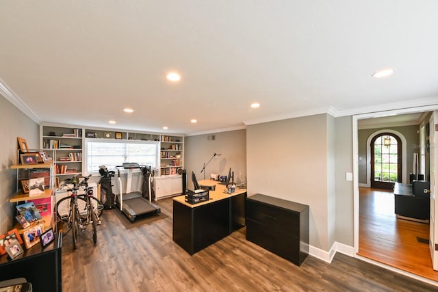 office space with baseboards, ornamental molding, dark wood finished floors, and recessed lighting