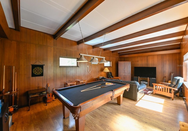 recreation room with pool table, beamed ceiling, wood walls, and wood finished floors