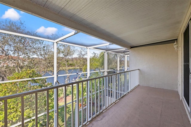 balcony featuring a water view