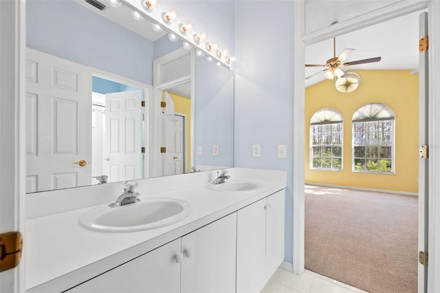 full bathroom with a ceiling fan, visible vents, a sink, and double vanity