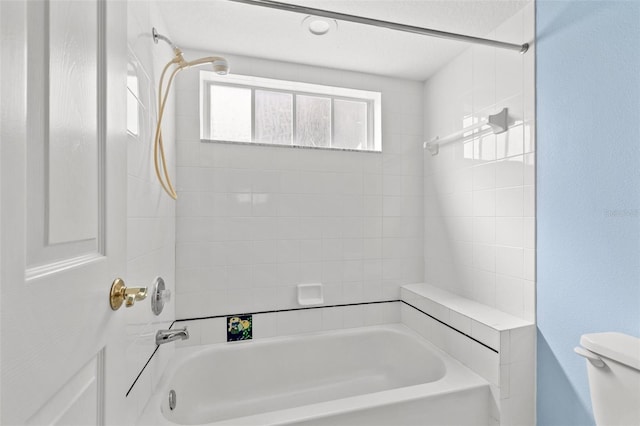 full bathroom featuring shower / bathing tub combination and toilet