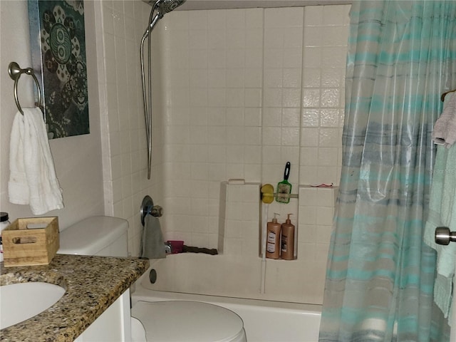 full bath featuring toilet, vanity, and shower / bathtub combination with curtain