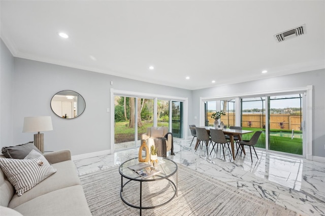 living area featuring recessed lighting, marble finish floor, visible vents, and baseboards