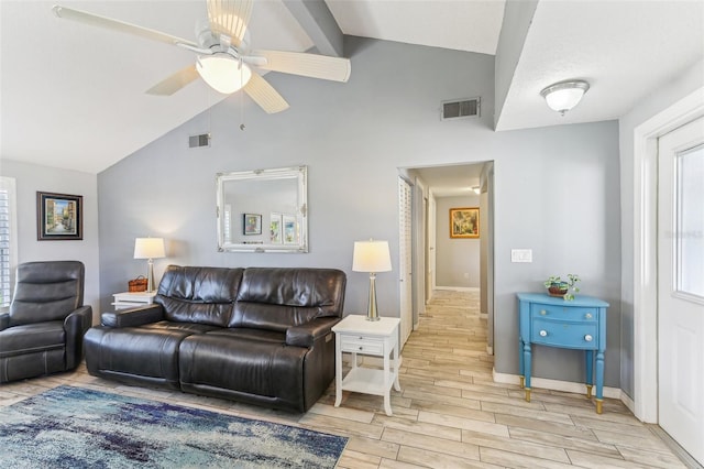 living room with lofted ceiling, a ceiling fan, visible vents, and wood tiled floor