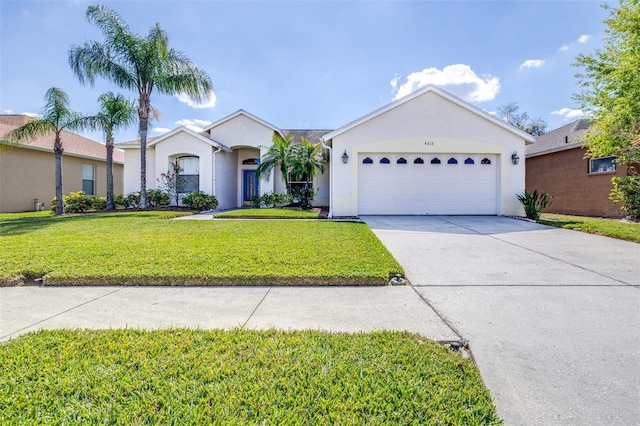 ranch-style home with driveway, a front lawn, an attached garage, and stucco siding