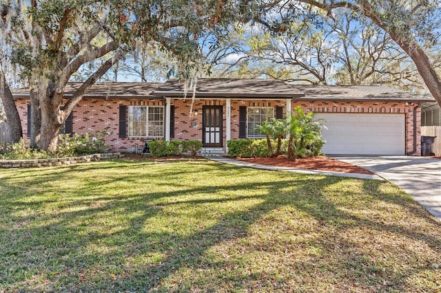 ranch-style house featuring a garage, a front yard, concrete driveway, and brick siding