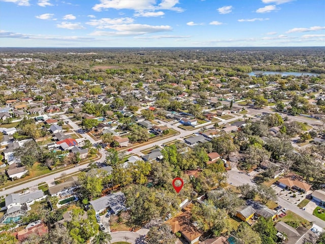 aerial view featuring a residential view and a water view