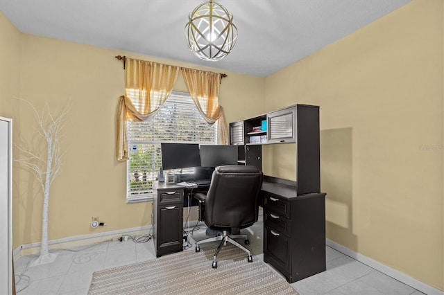 office area featuring tile patterned flooring and baseboards