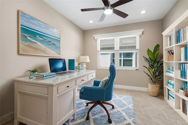 office space featuring light tile patterned floors, baseboards, a ceiling fan, and recessed lighting