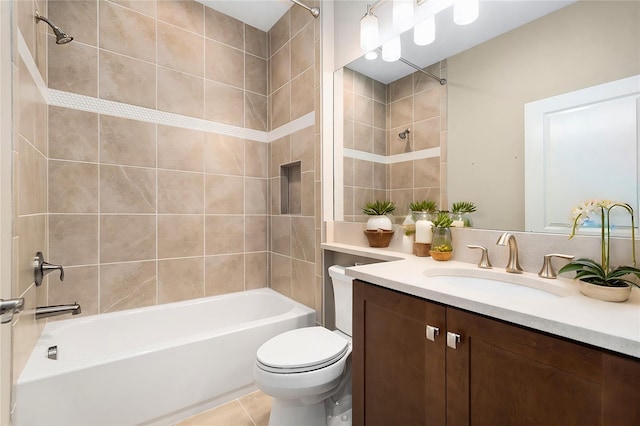 bathroom with  shower combination, vanity, toilet, and tile patterned floors