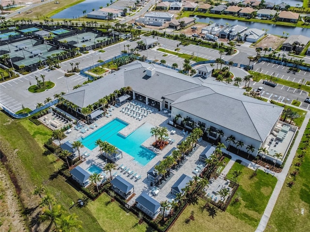 aerial view featuring a residential view and a water view