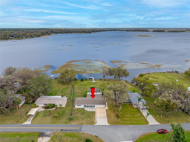 drone / aerial view with a water view