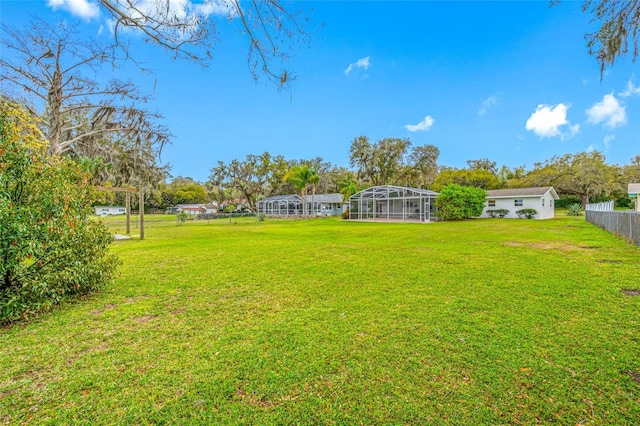 view of yard featuring fence