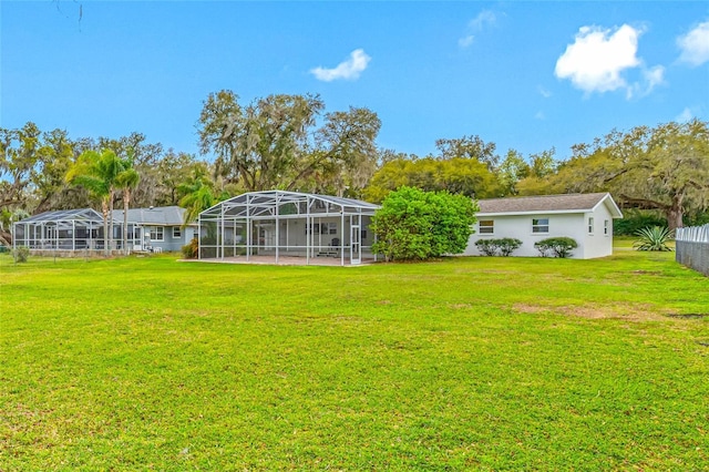 view of yard with a lanai