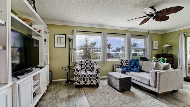 1320 Bottlebrush Dr, Bradenton, FL 34208 - living room with ceiling fan, crown molding, a textured ceiling, and baseboards