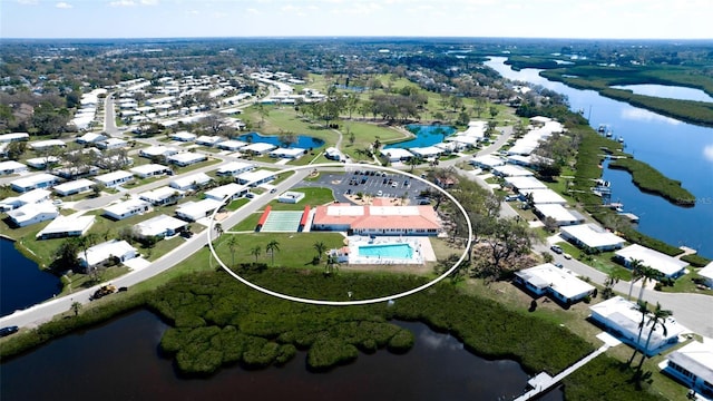1320 Bottlebrush Dr, Bradenton, FL 34208 - aerial view of property and surrounding area featuring a large body of water and nearby suburban area