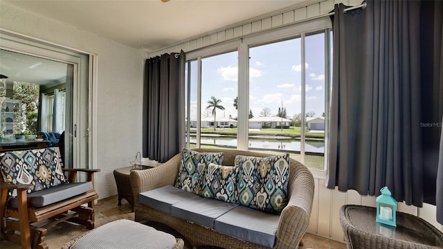 1320 Bottlebrush Dr, Bradenton, FL 34208 - living room featuring a water view, plenty of natural light, and a textured wall