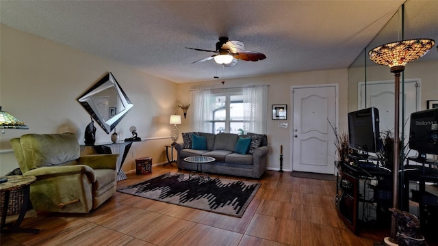 1320 Bottlebrush Dr, Bradenton, FL 34208 - living room with a ceiling fan and a textured ceiling