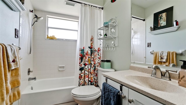 1320 Bottlebrush Dr, Bradenton, FL 34208 - bathroom featuring vanity, shower / bath combination with curtain, and toilet